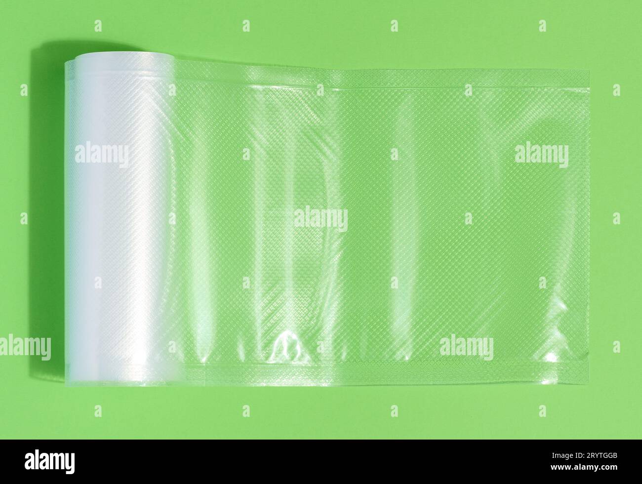 Roll with plastic film for vacuum packaging of products, hermetic