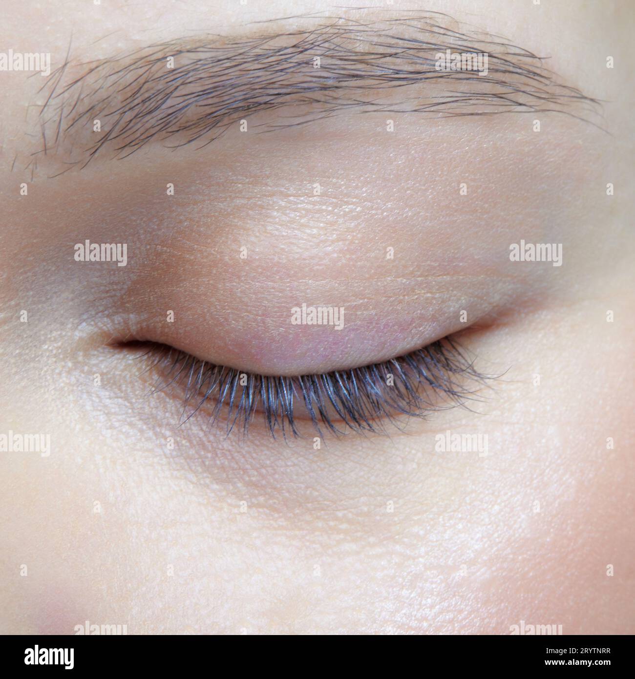 Closeup macro shot of human female eye. Woman with natural face beauty makeup Stock Photo