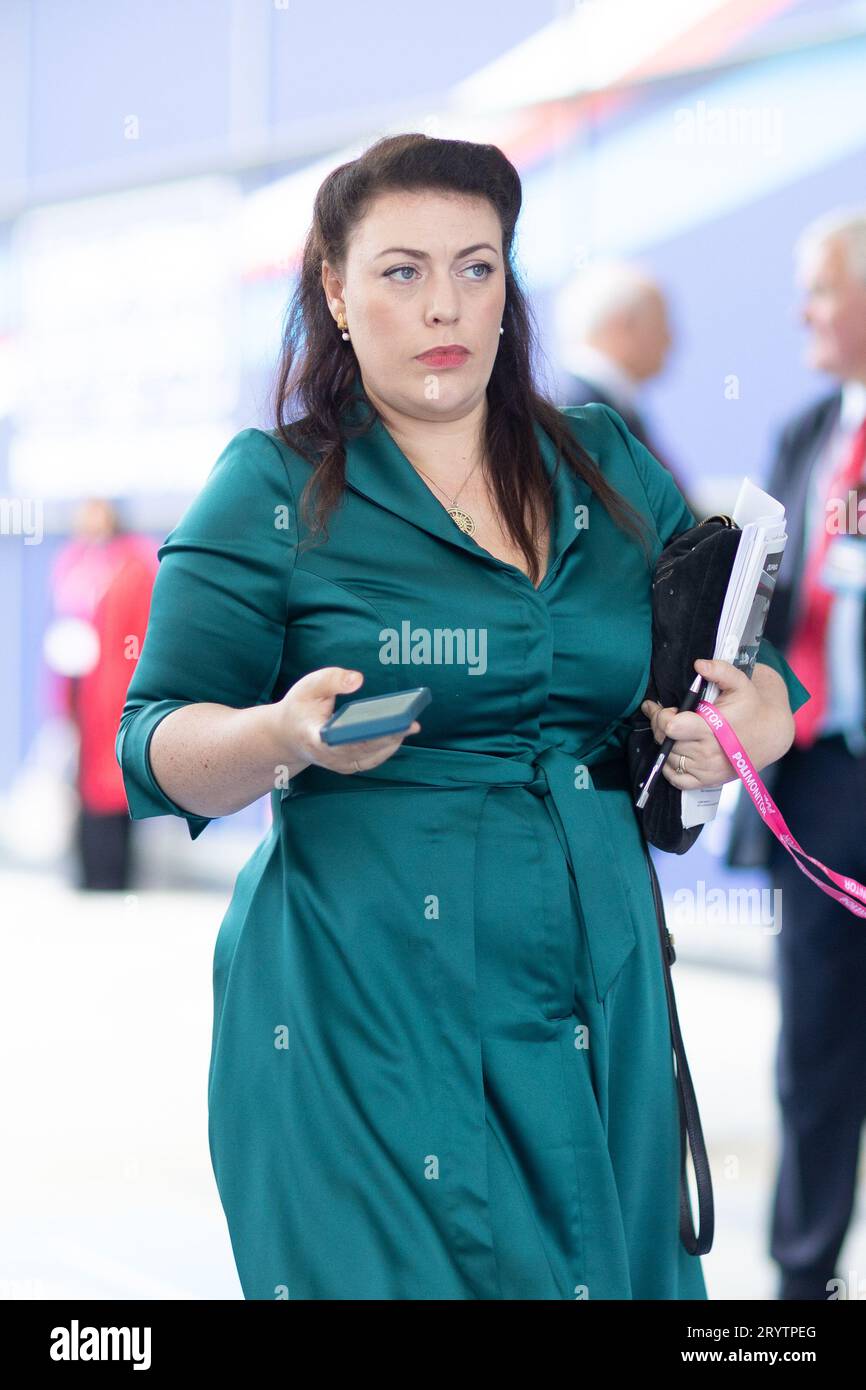 Alicia Kearns MP, with matching outfit and phone case, during the Conservative Party Conference at Manchester Central Convention Complex, Manchester on Monday 2nd October 2023. (Photo: Pat Scaasi | MI News) Credit: MI News & Sport /Alamy Live News Stock Photo