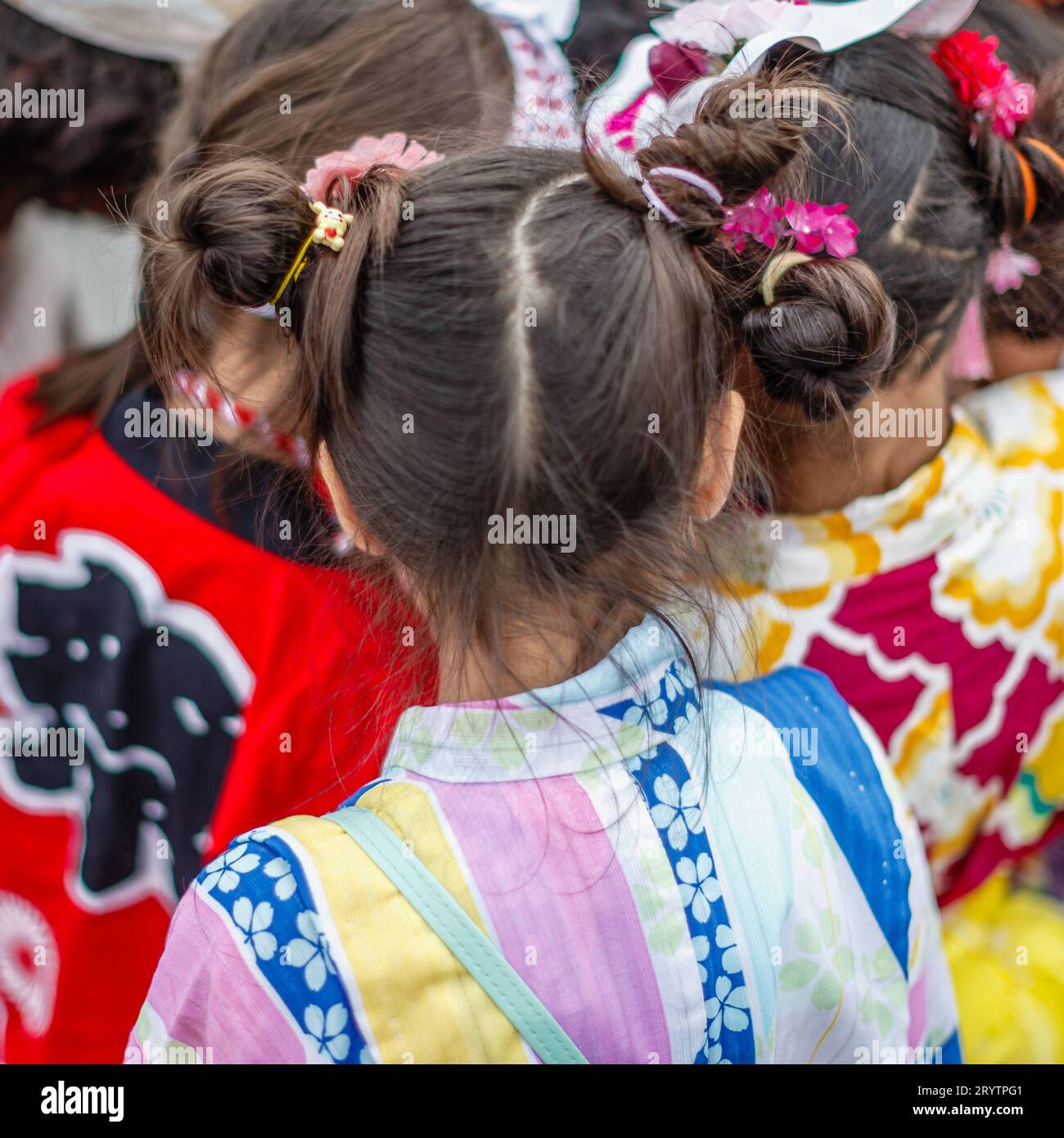 Children in colourful outfits and traditional hairstyles at Japan Matsuri 2023 in London. Stock Photo