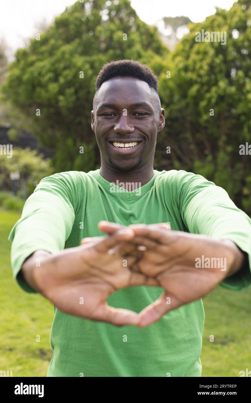 Attractive young african man stretching hi-res stock photography and ...