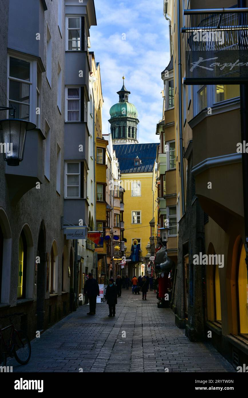 The tower of the 1553 A.D. Gothic Court Church/Hofkirche Innsbruck from the narrow pedestrian street Riesengasse. Innsbruck, Austria Stock Photo