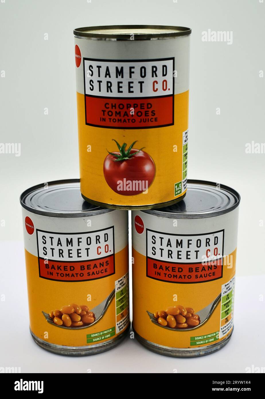 Sainsbury's supermarket has moved its value brands, including baked beans and tinned tomatoes, to a new label - Stamford Street Co. Stock Photo