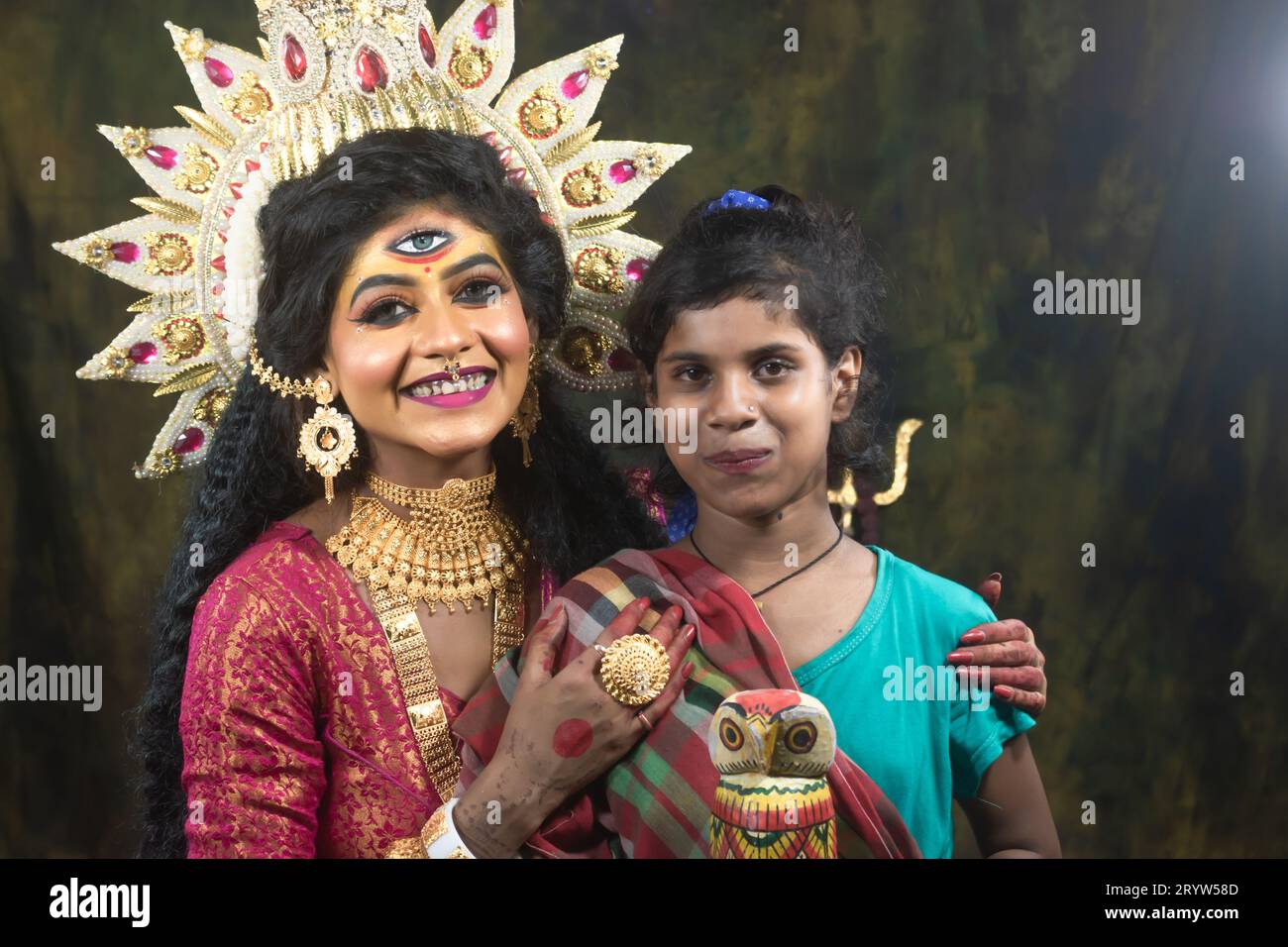 A Concept Agomoni  photoshoot  for Unloved underprivileged children. Maa Durga agomoni shoot concept.Indian culture durga puja.. Stock Photo