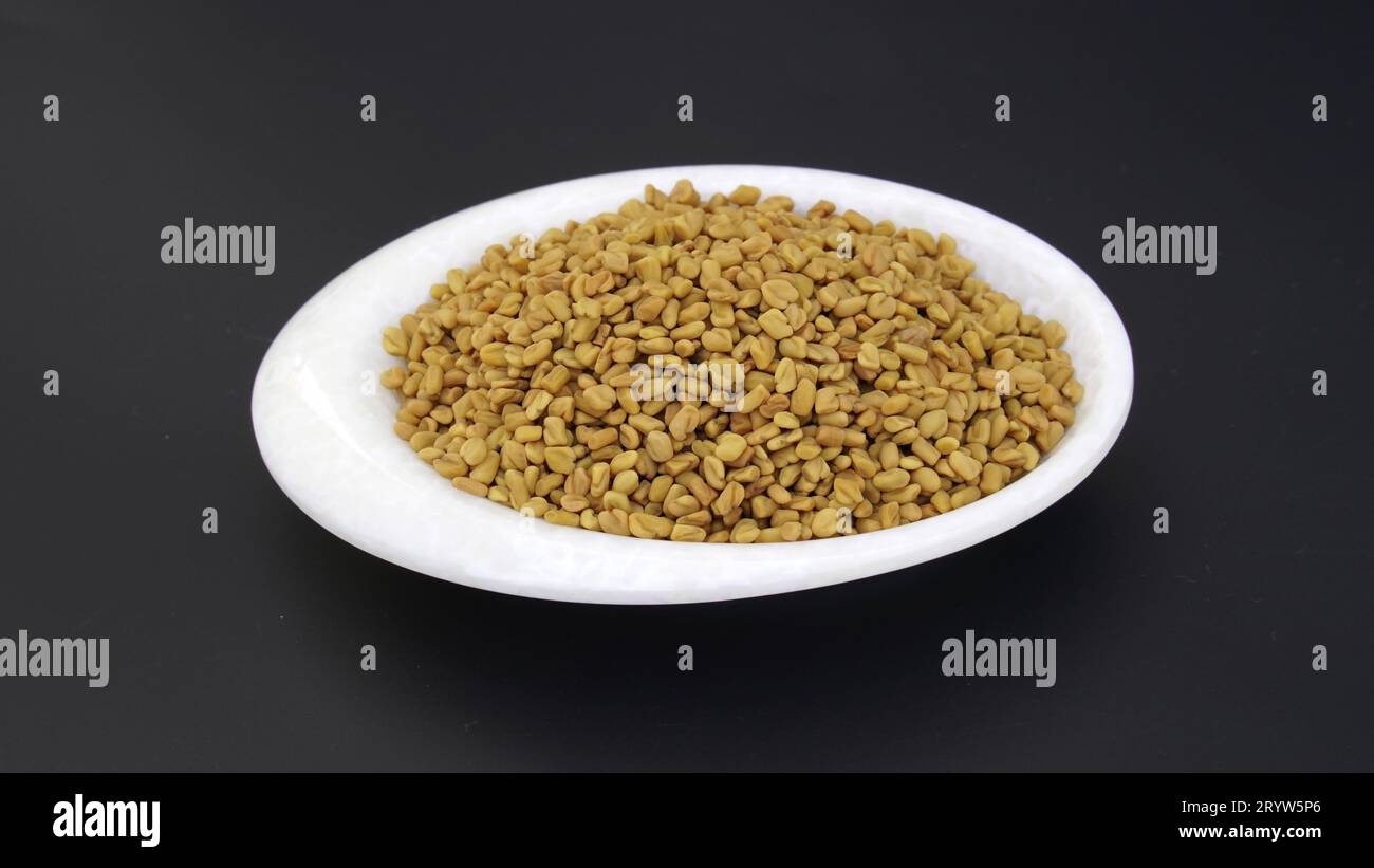 Fenugreek seeds, spices closeup. Indian and Arabic spices for cooking