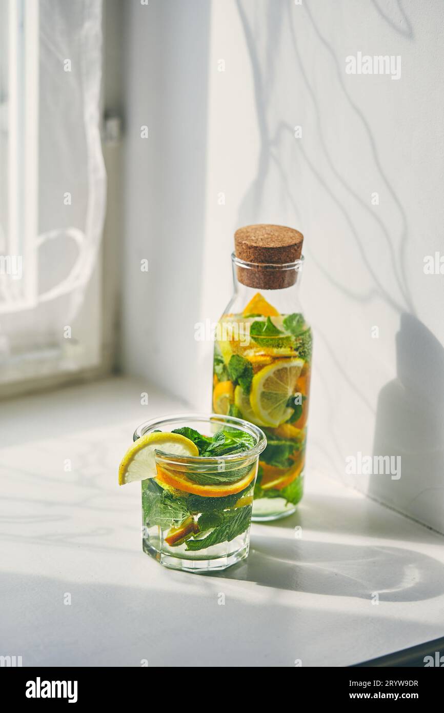 Fresh cool lemon-mint water, cocktail, detox drink. Stock Photo