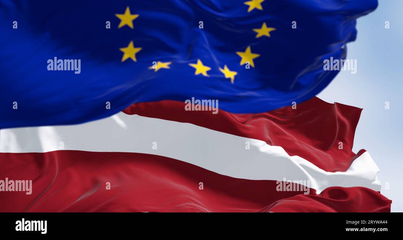 Flags of Latvia and the European Union waving together Stock Photo - Alamy