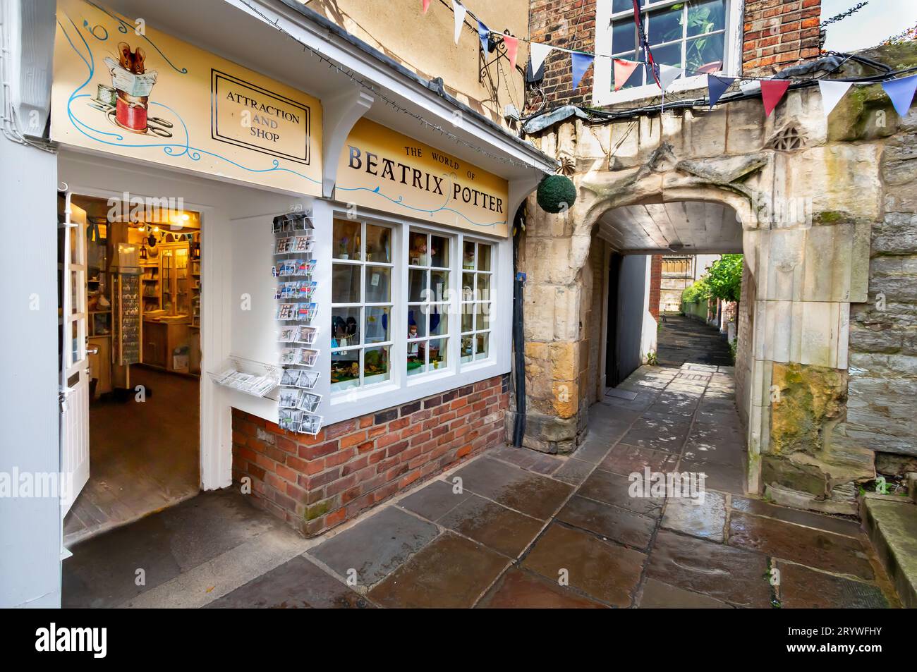 Beatrix Potter, The House of the Tailor of Gloucester, in College Court, in the shadow of Gloucester Cathedral. Stock Photo