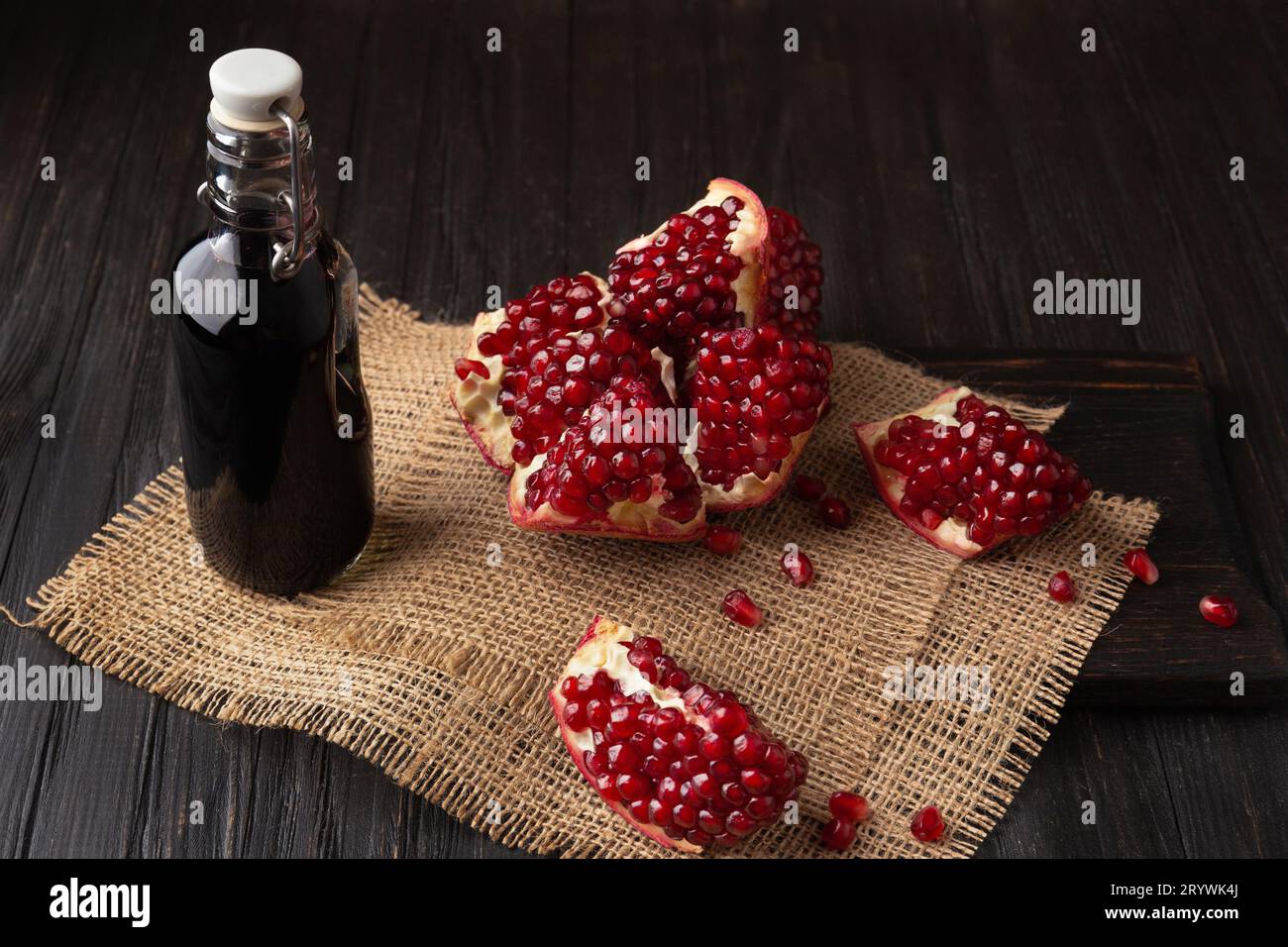 Top view pomegranate wine, bottle opener and fruit Stock Photo - Alamy