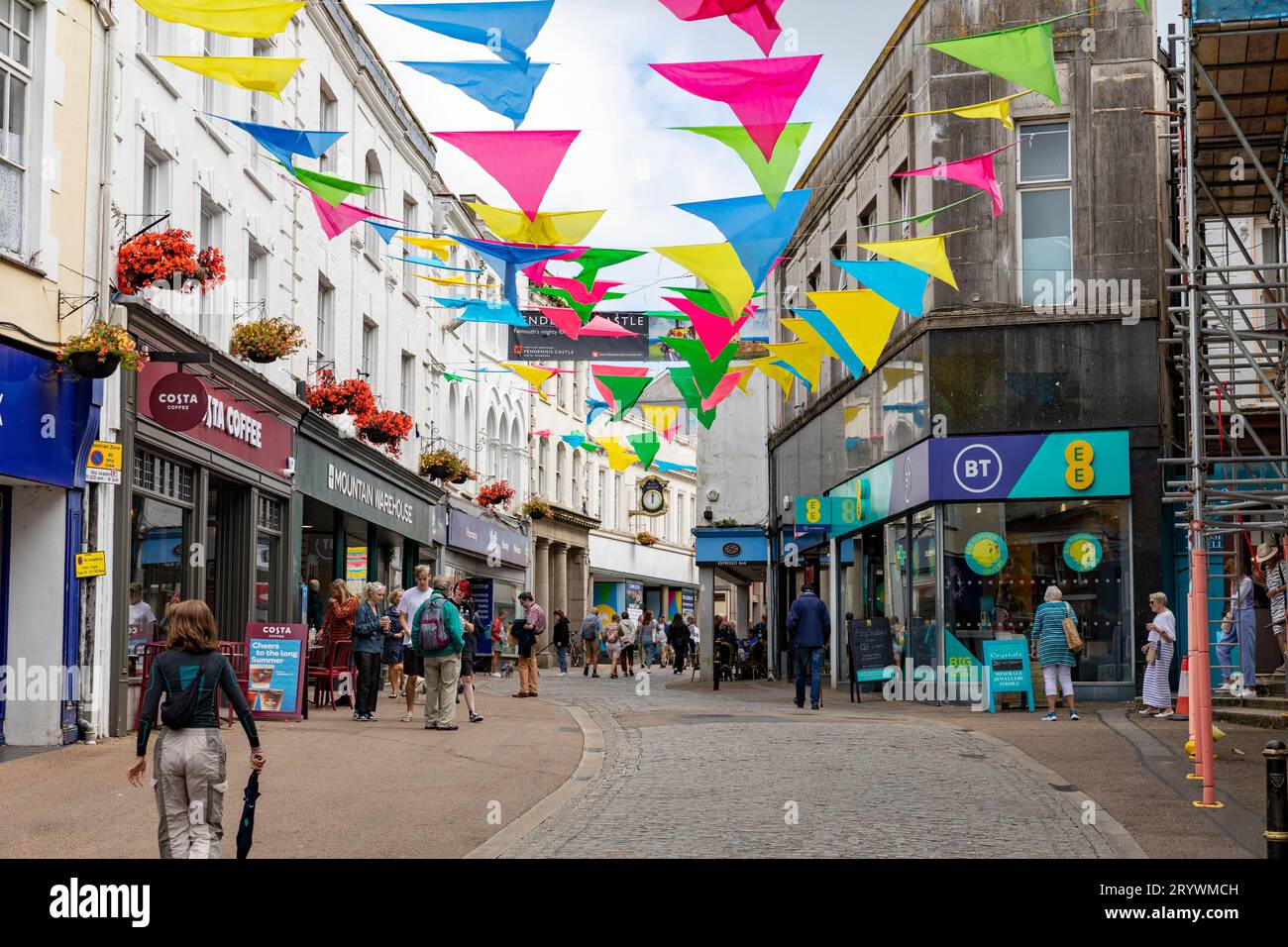Falmouth Cornwall, high street, street bunting above the shops and stores in Falmouth town centre,England,UK,2023 Stock Photo