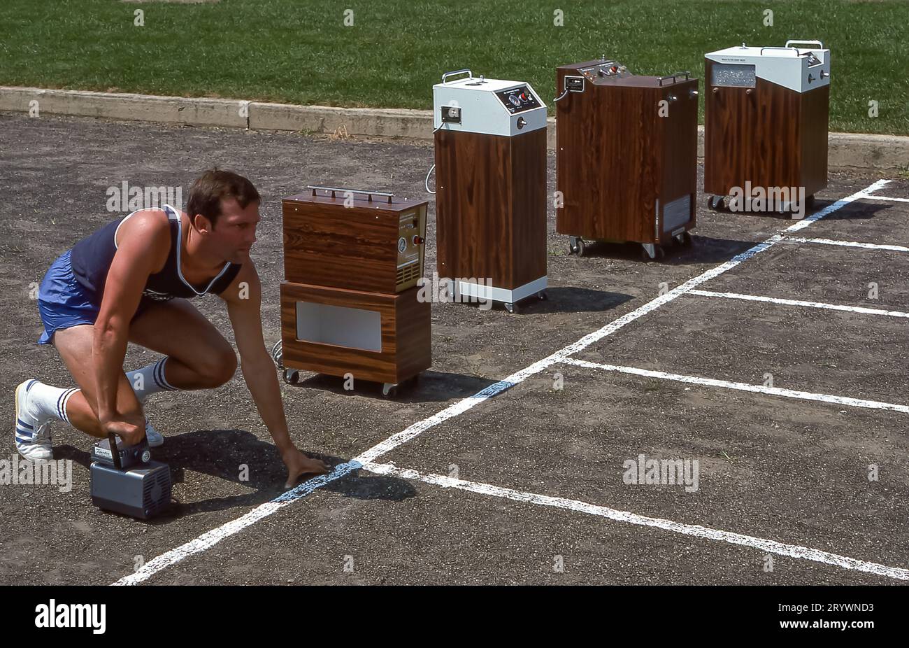 Exercise Testing Kit Athlete prepares for a fitness evaluation beside portable medical ...