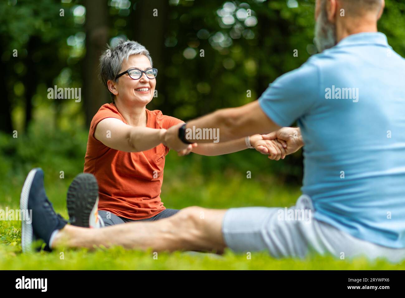 Sport Activities For Seniors. Portrait Of Older Couple Training