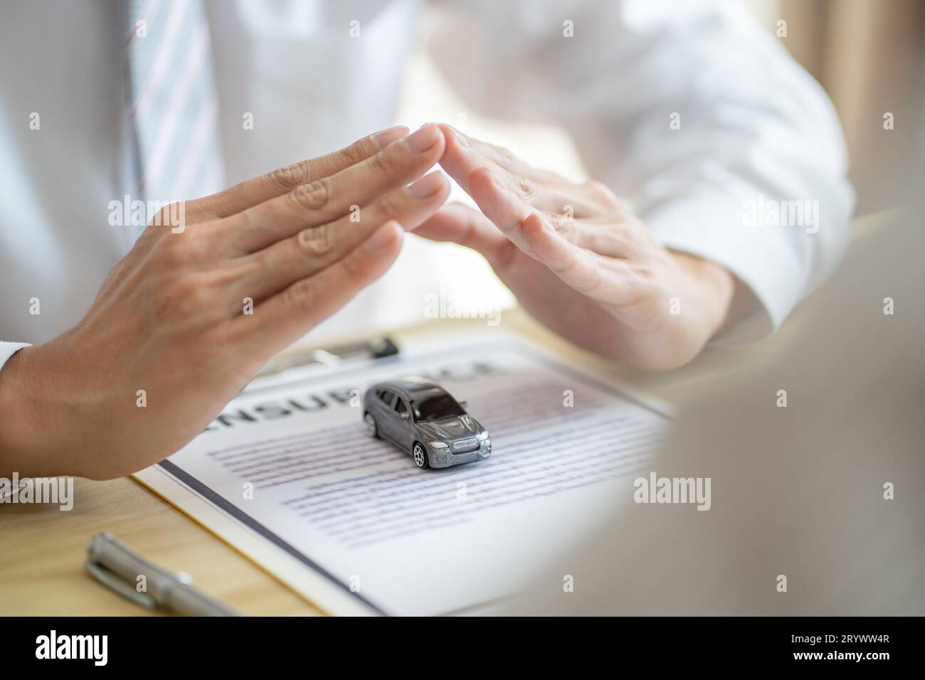 Loss Adjuster Insurance Agent Inspecting Damaged Car. Sales manager