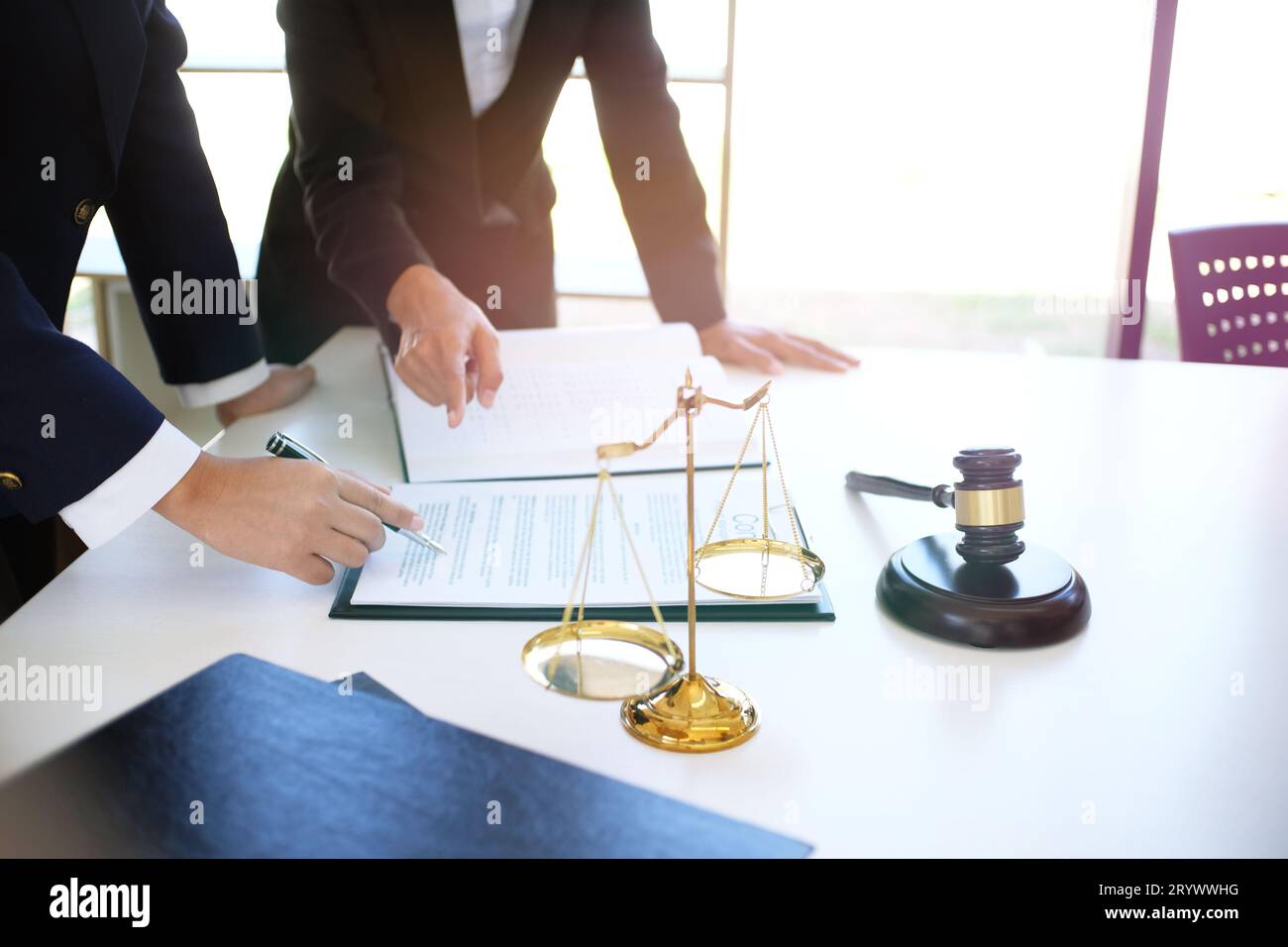 Female lawyer Legal counsel presents to the client a signed contract