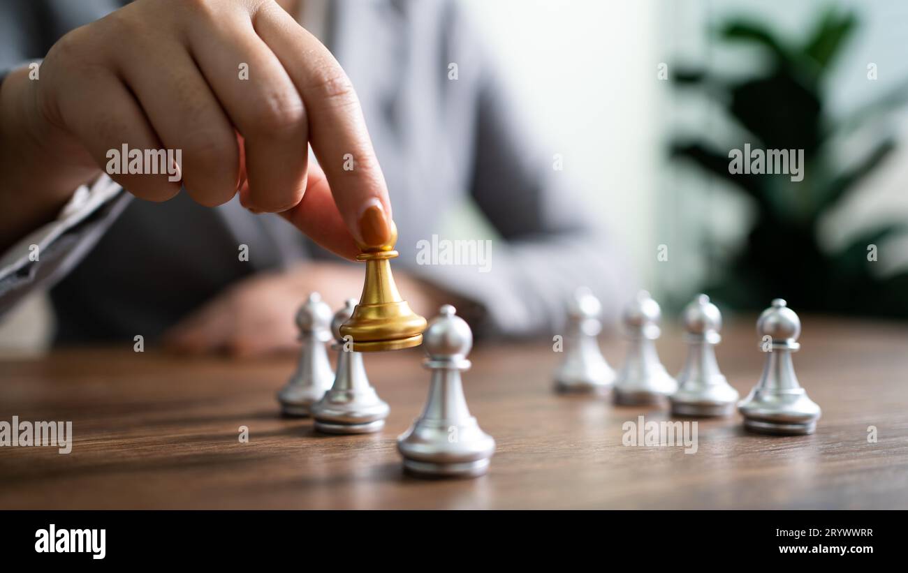 Human resources concept career management with clasped hands planning strategy with chess figures. HR department Search for empl Stock Photo