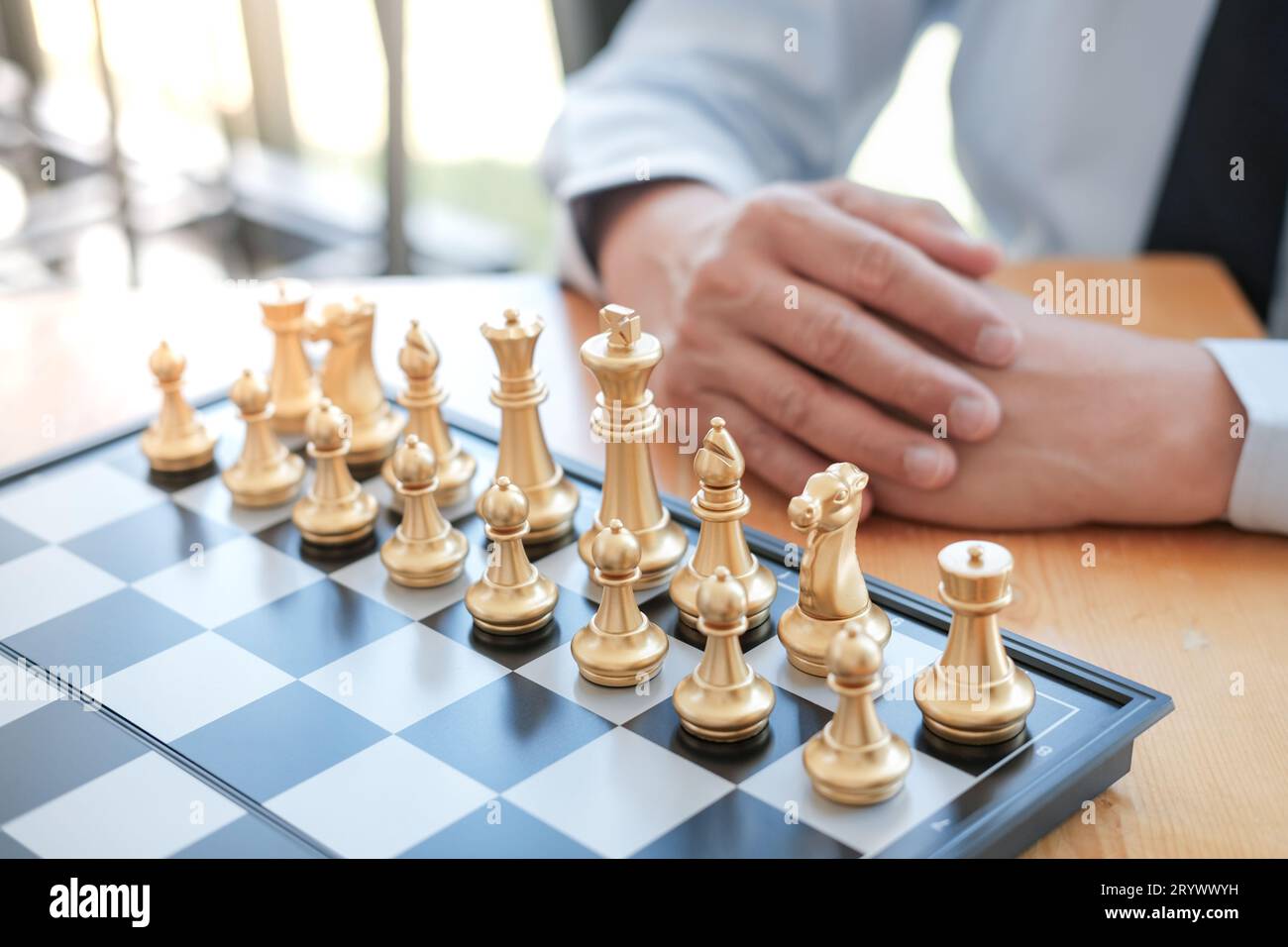 Businessman play with chess game. success management concept of business strategy and tactic challenge. Stock Photo