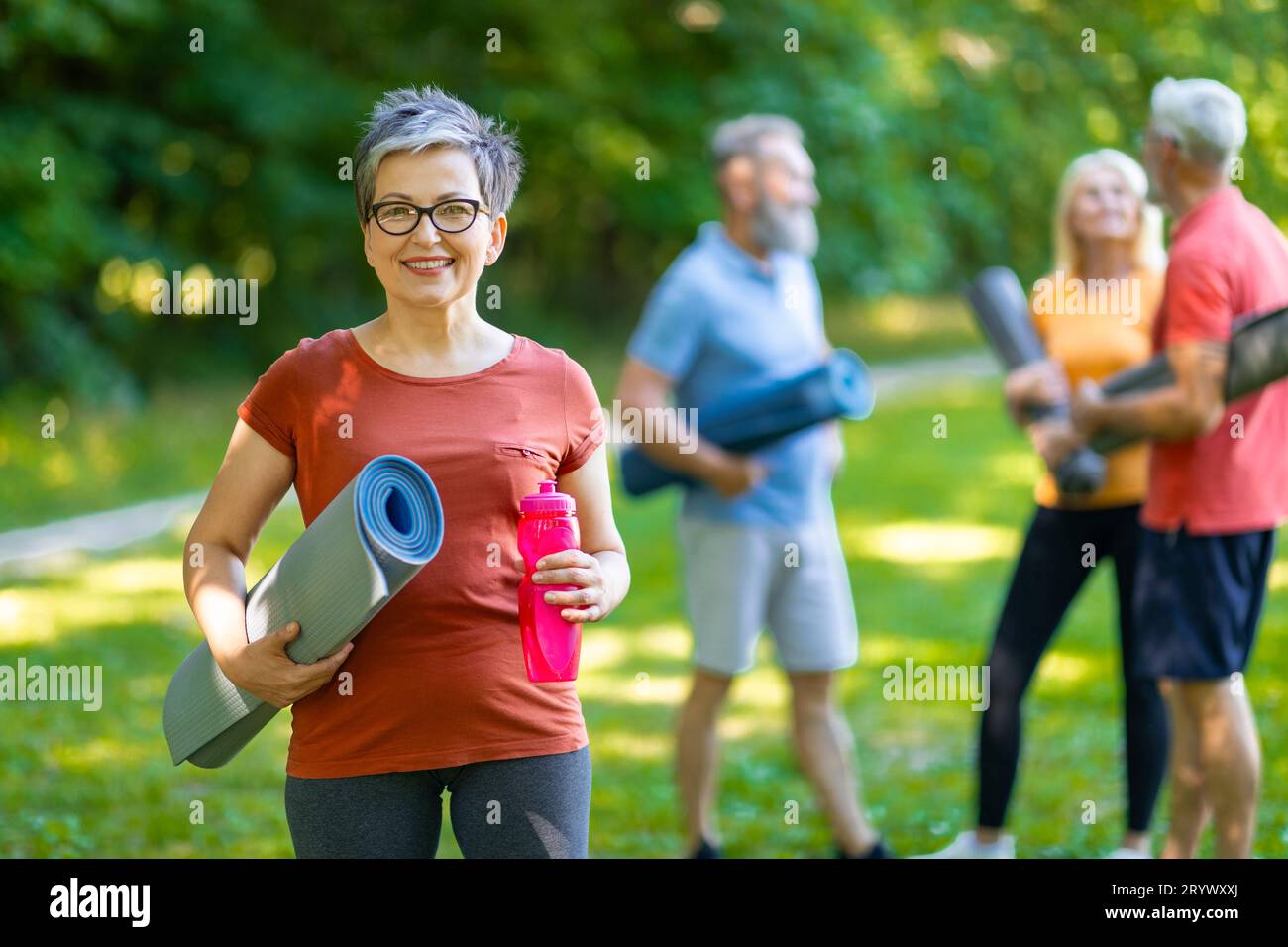 Happy sporty family group hi-res stock photography and images - Alamy