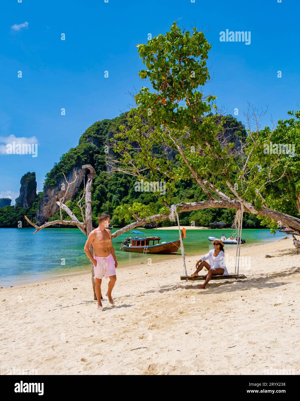 Men and women at Pakbia Island part of the Koh Hong Islands Krabi Thailand, the tropical beach Krabi Stock Photo