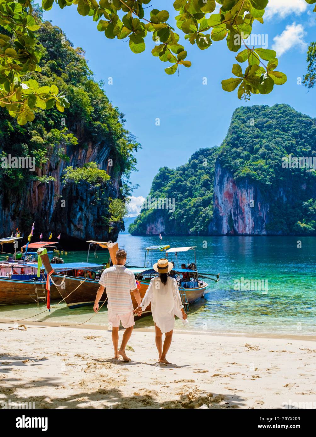 Men and women at the Tropical lagoon of Koh Loa Lading Krabi Thailand part of Koh Hong Islands Stock Photo
