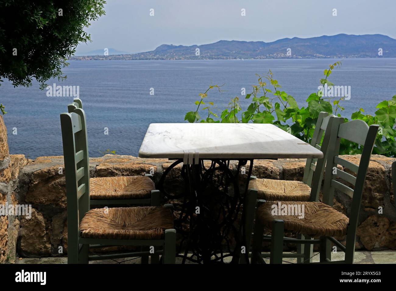 Small cafe by the sea, Agistri island, Saronic island group, Greece. Taken May 2023 Stock Photo
