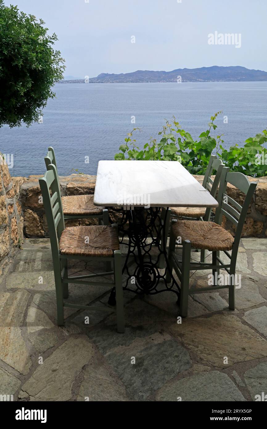 Small cafe by the sea, Agistri island, Saronic island group, Greece. Taken May 2023 Stock Photo