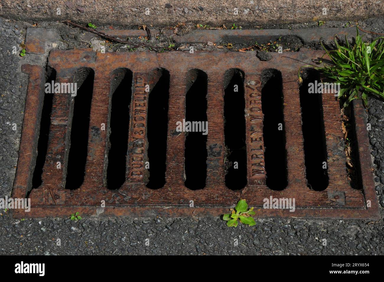 Cast iron road drain grill Stock Photo Alamy