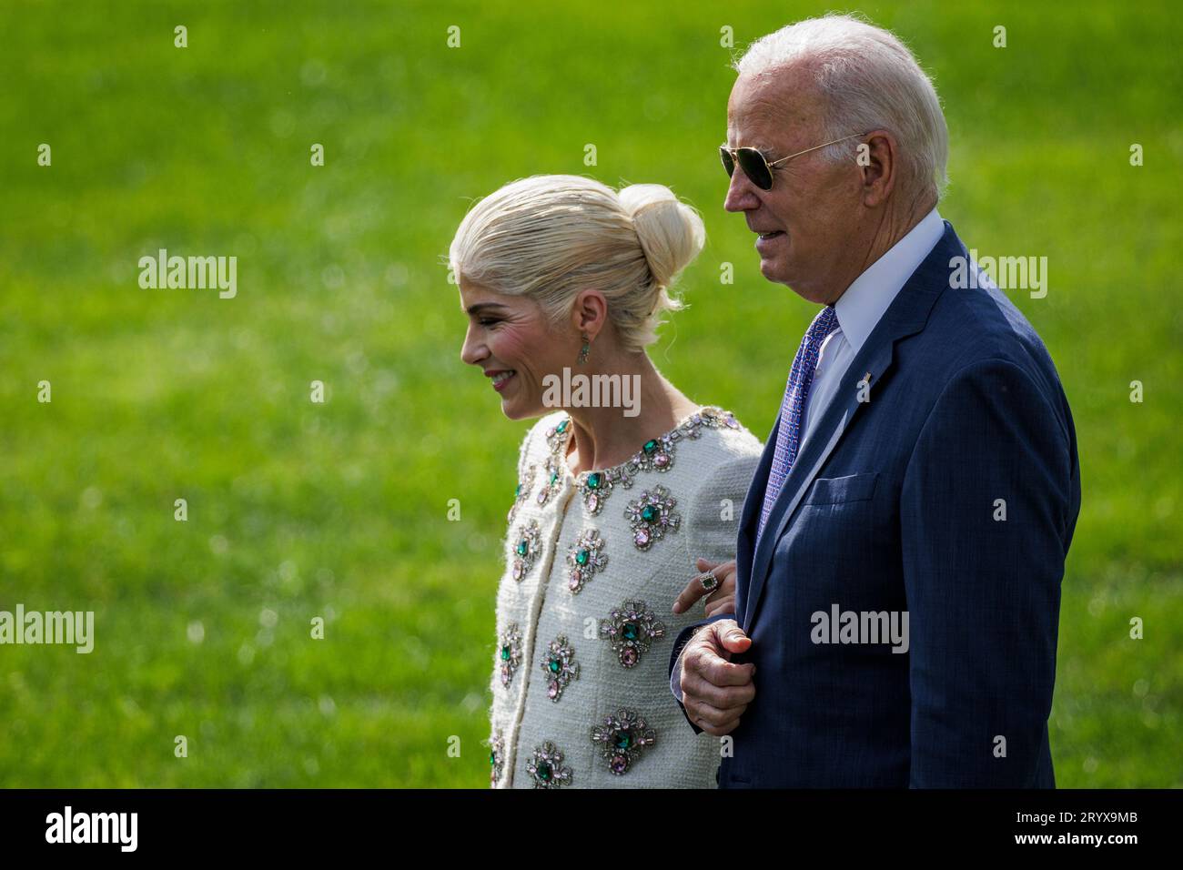 President Joe Biden And Actress Selma Blair L Walk Together Before An President joe biden and actress selma blair l walk together before an