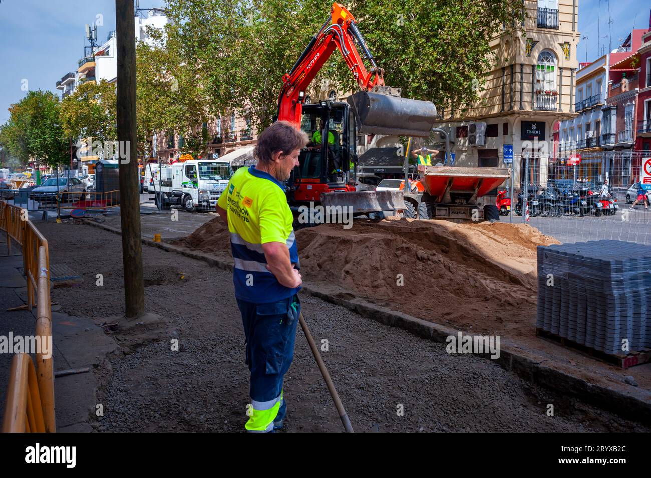 Seville Spain, Construction WOrkers on Street, in Old Town Center, Heat Wave Stock Photo