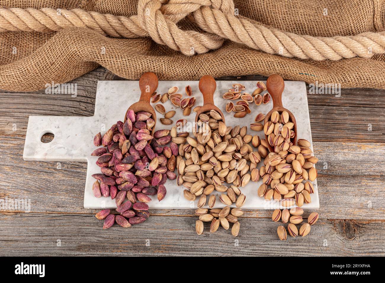 Display of raw, Siirt pistachios and pistachios on the marble floor