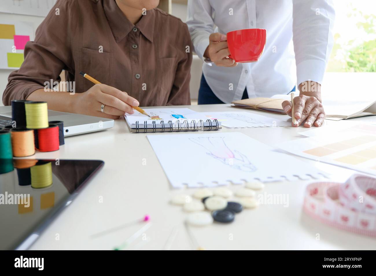 Tailor designer hi-res stock photography and images - Alamy