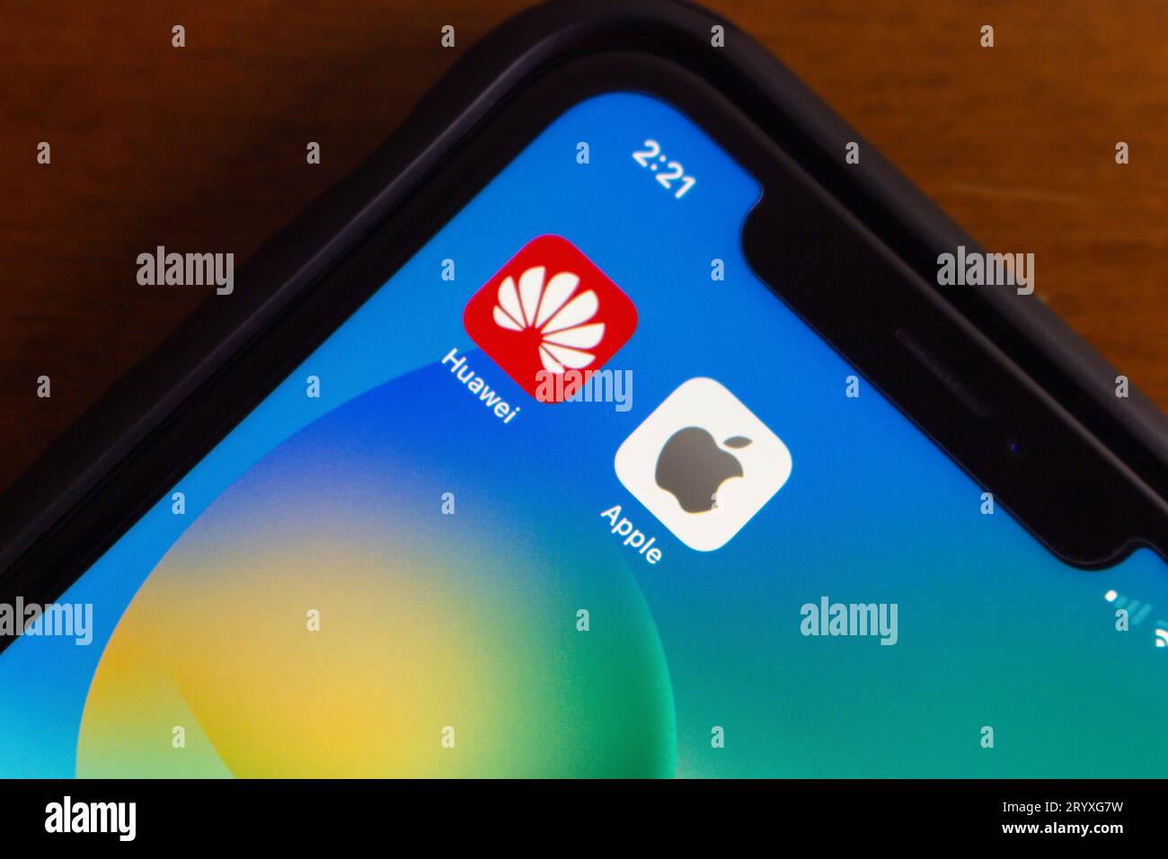 Vancouver, CANADA - Sep 27 2023 : Icons of Huawei and Apple seen in iPhone screen. Two big companies in smartphone and technology industry concept Stock Photo