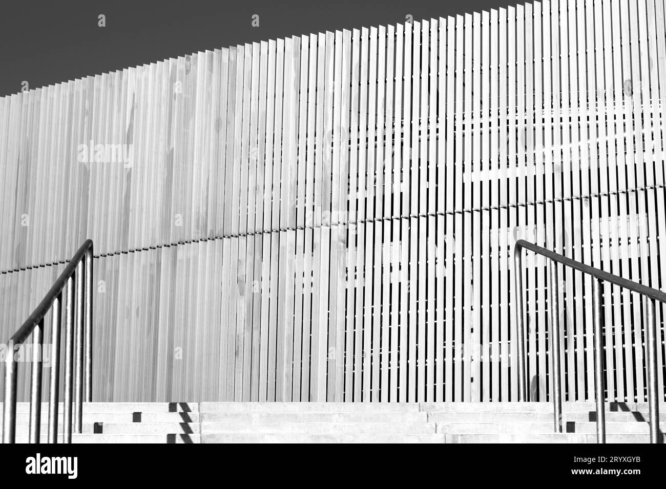 The abstract view of stairs and tall modern fence of a stadium in Kaunas city (Lithuania). Stock Photo