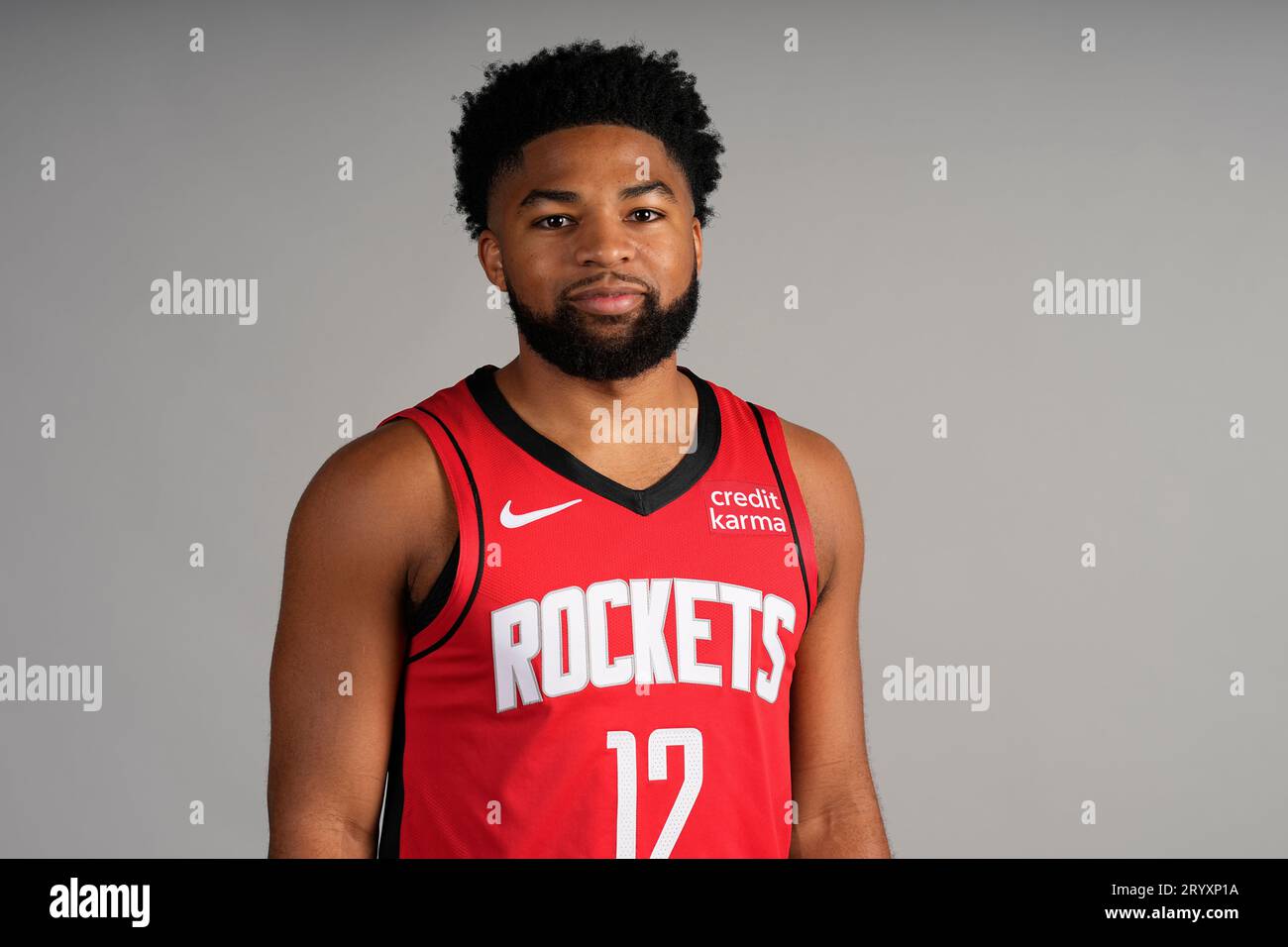 Houston Rockets' Trevor Hudgins poses for a photograph during an NBA