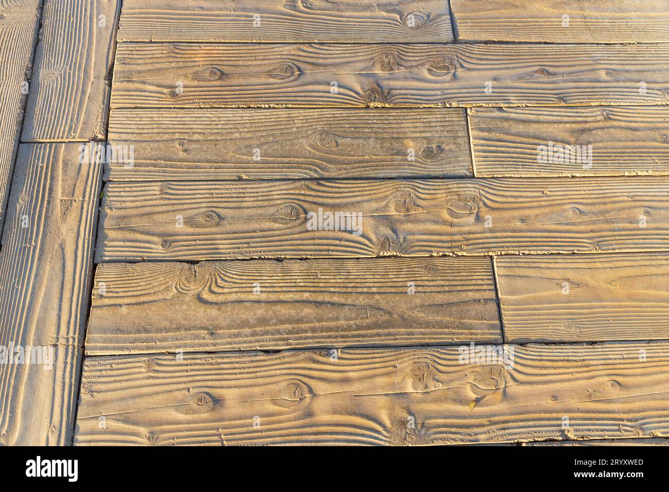 Structure of a sidewalk made of concrete with a wood pattern Stock Photo