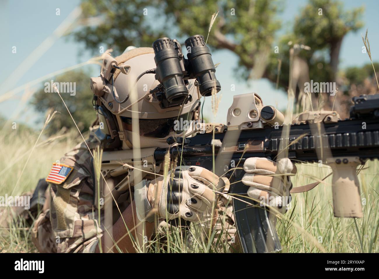 Special forces soldier in camouflage with a pair of weapons that are full of modern technology and complete for battle Stock Photo