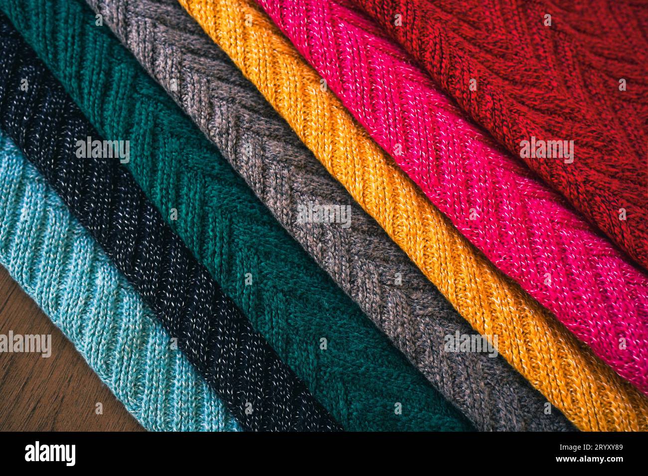 Multi colored Knitted woolen Â fabric texture background for winter. Stock Photo