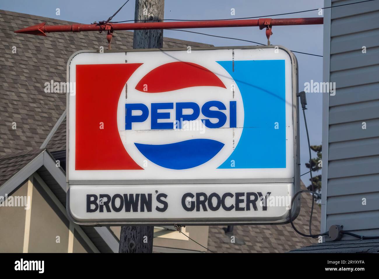 Calgary, Alberta, Canada. July 20, 2023. A Vintage PEPSI sign at a grocery shop. Stock Photo