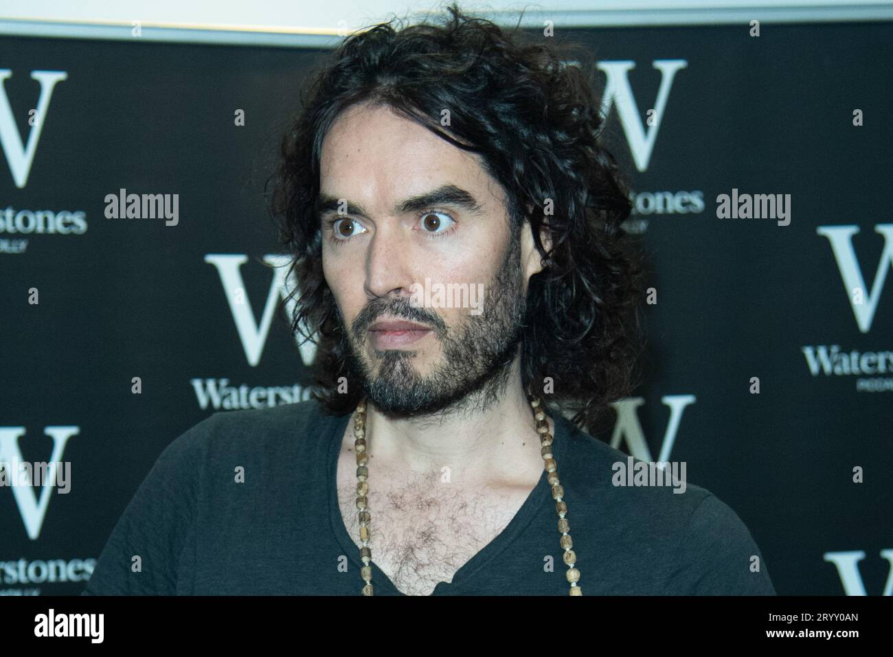 London, UK. 05 Dec, 2014. Comedian Russell Brand signs copies of his books 'Revolution' and 'The Pied Piper Of Hamelin' at Waterstones Piccadilly. Cre Stock Photo
