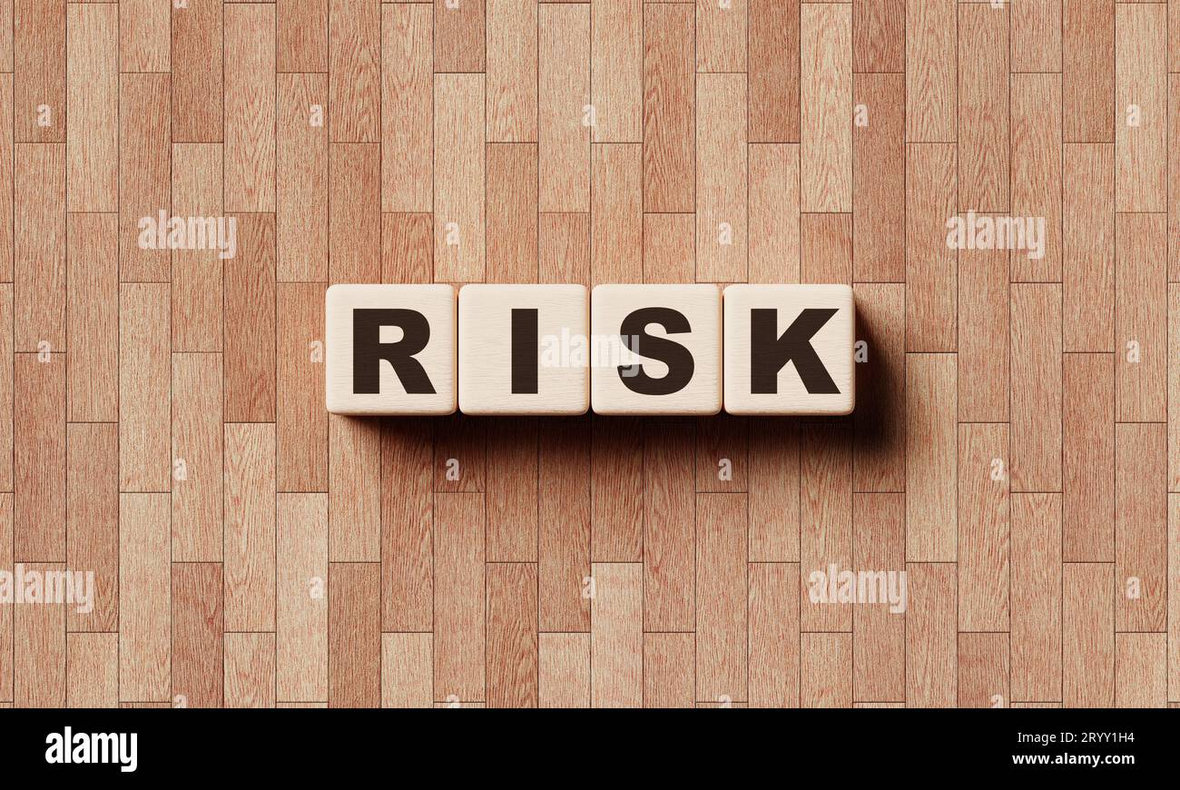 RISK wooden word block cubes with a laminate background. Production and ...