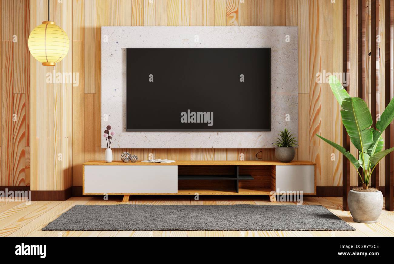 Japanese style modern living room with hanging mockup television tv on wall background. Interior and architecture concept. 3D il Stock Photo