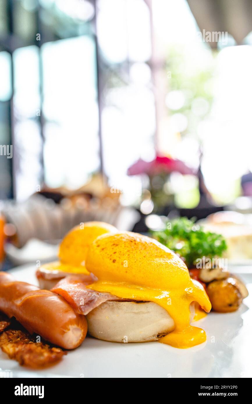 Eggs Benedict toasted English muffins. Delicious breakfast with eggs