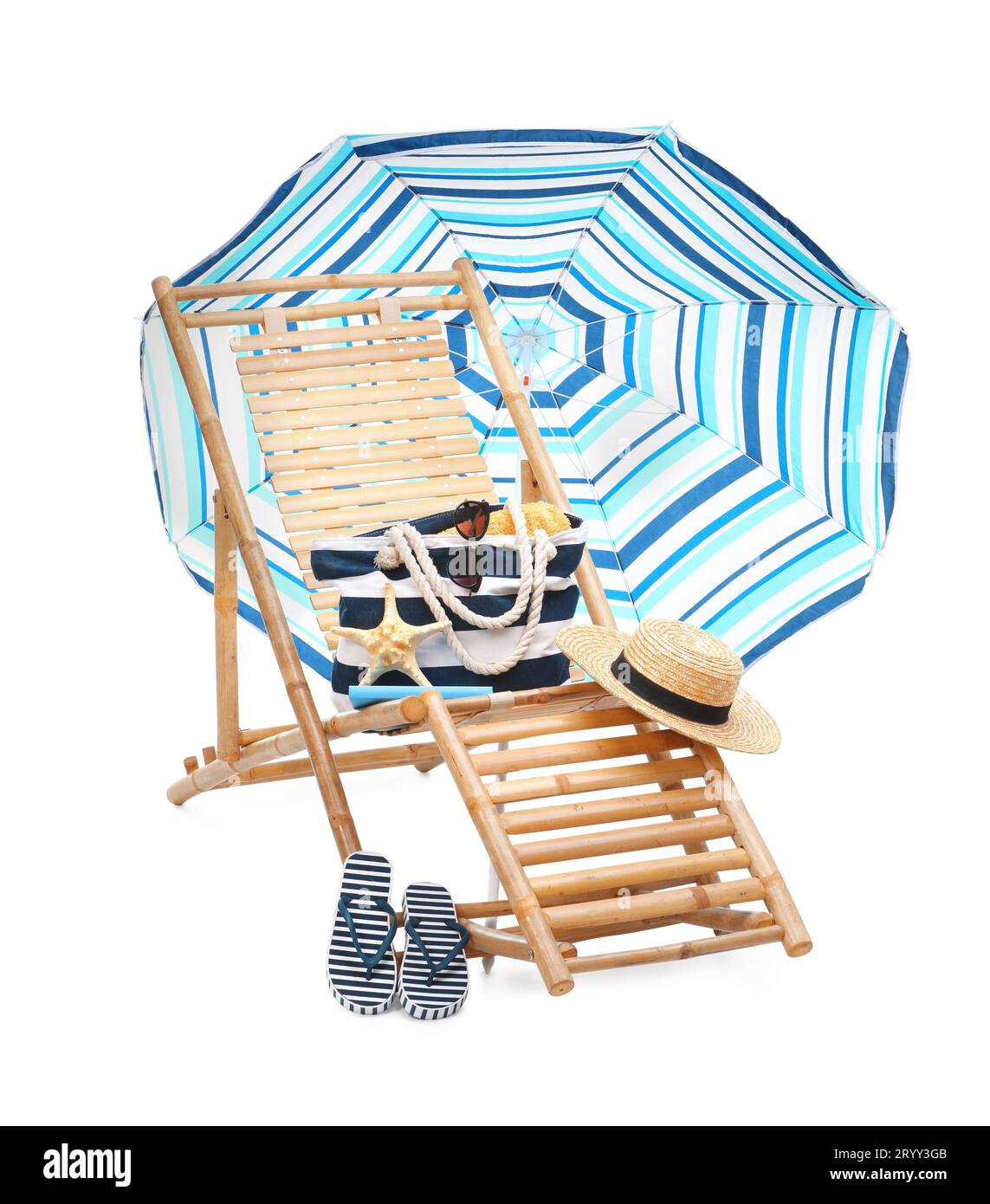 Deck chair, umbrella and other beach accessories isolated on white ...