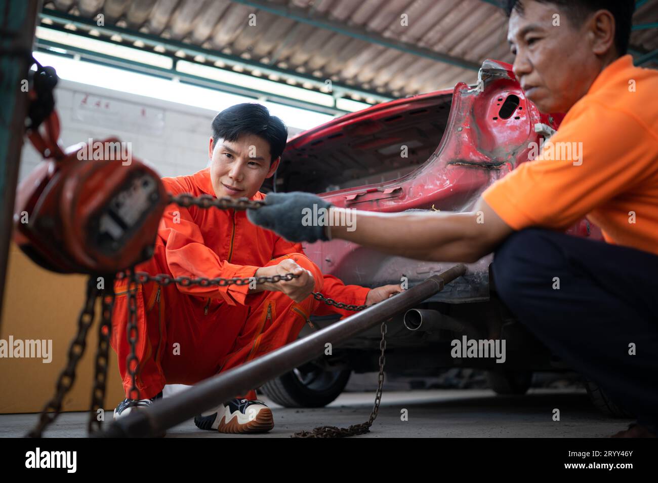 To return the automobile body to its former shape, an auto repair