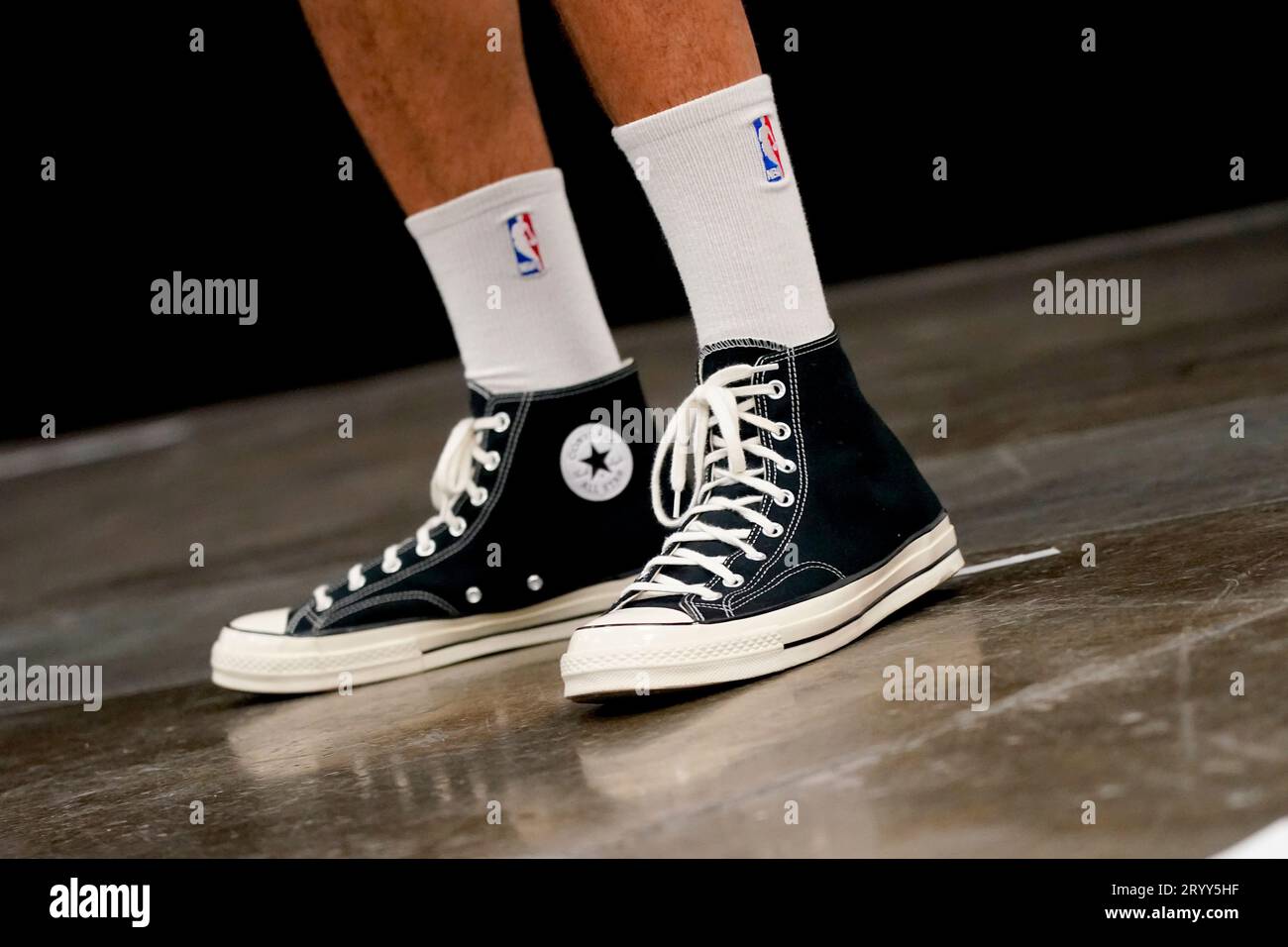 Phoenix Suns' Devin Booker wears Converse Chuck Taylor basketball shoes  while posing for a portrait during the NBA basketball team's media day,  Monday, Oct. 2, 2023, in Phoenix. (AP Photo/Matt York Stock