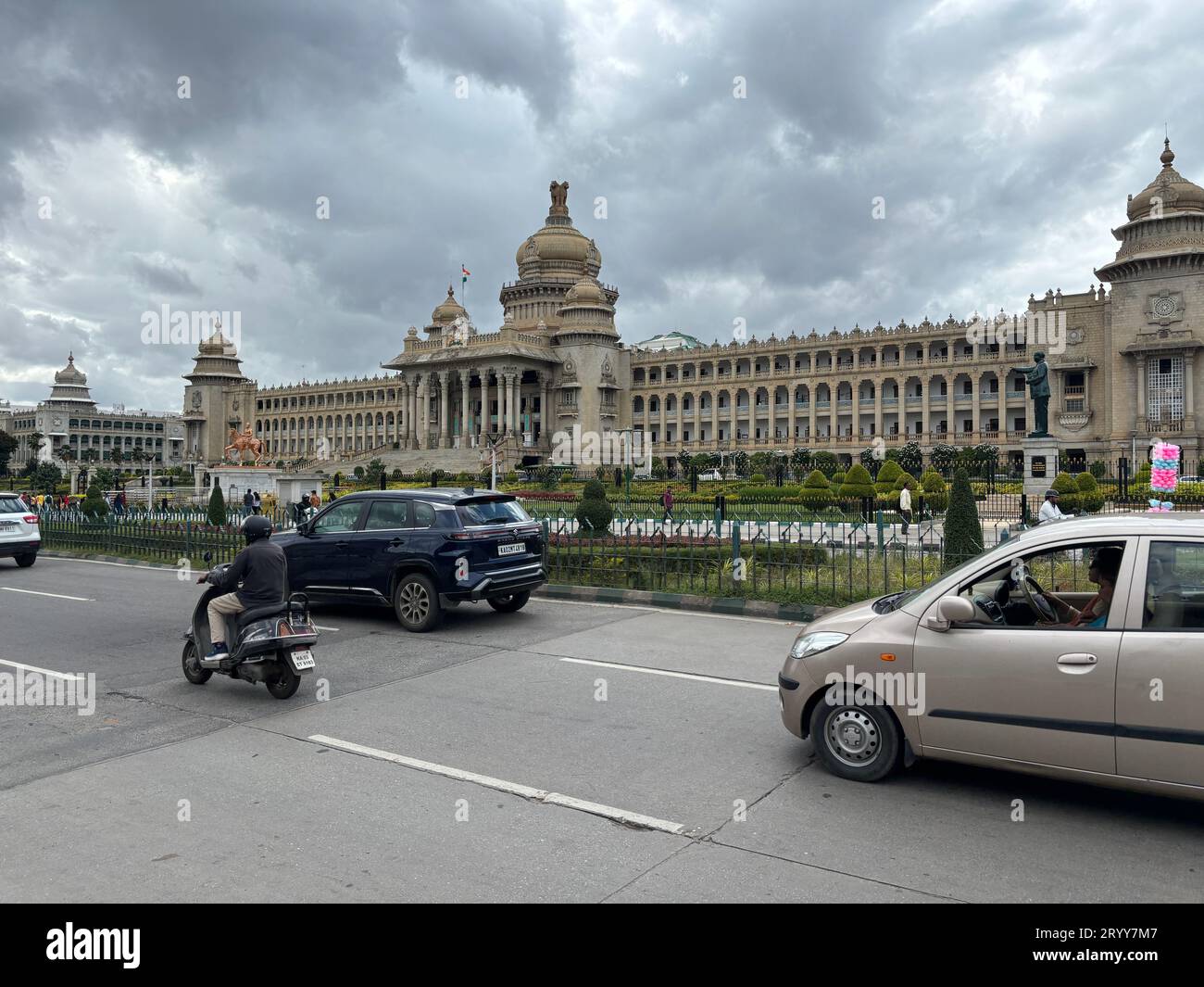 Exclusive day shots of Vidhana Soudha building with traffic on a overcast day Stock Photo