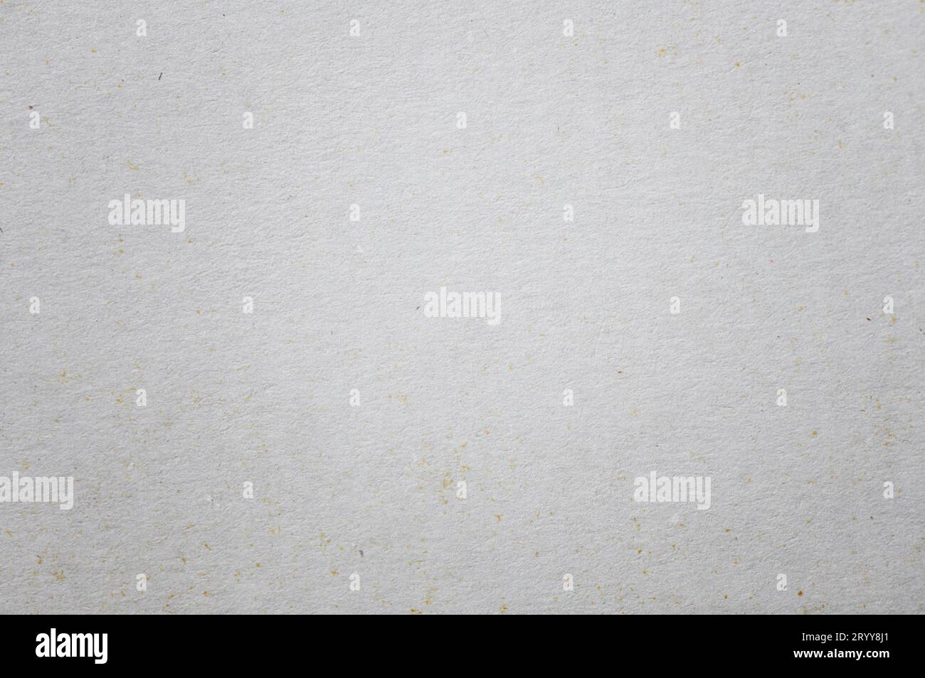 Old cardboard background texture. Closeup of white and gray paper wallpaper Stock Photo