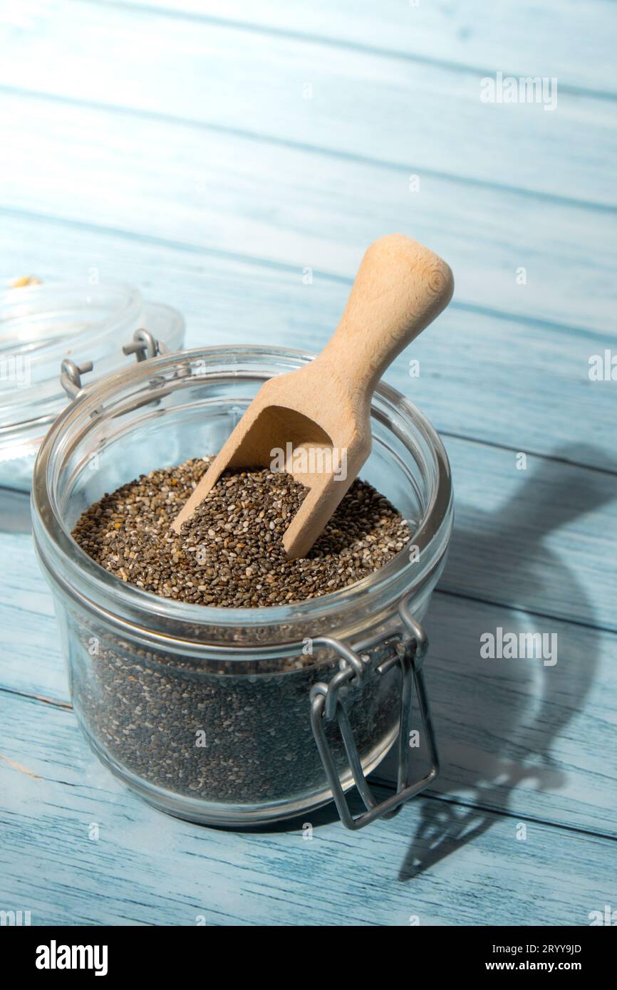 Chia seeds in glass jar. Healthy superfood rich in Omega 3 fatty acids