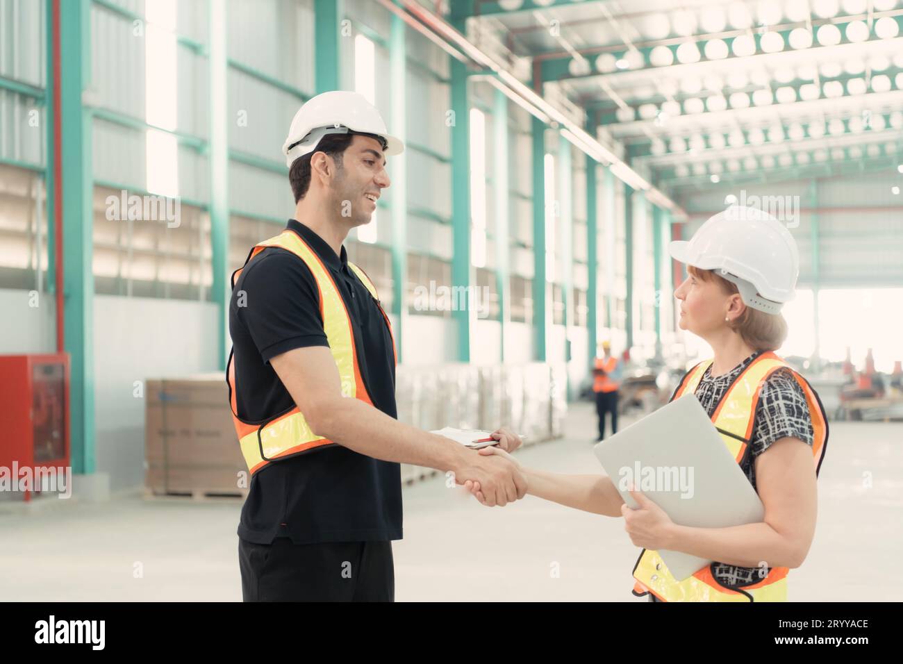 Meeting between designer and warehouse manager to organize the