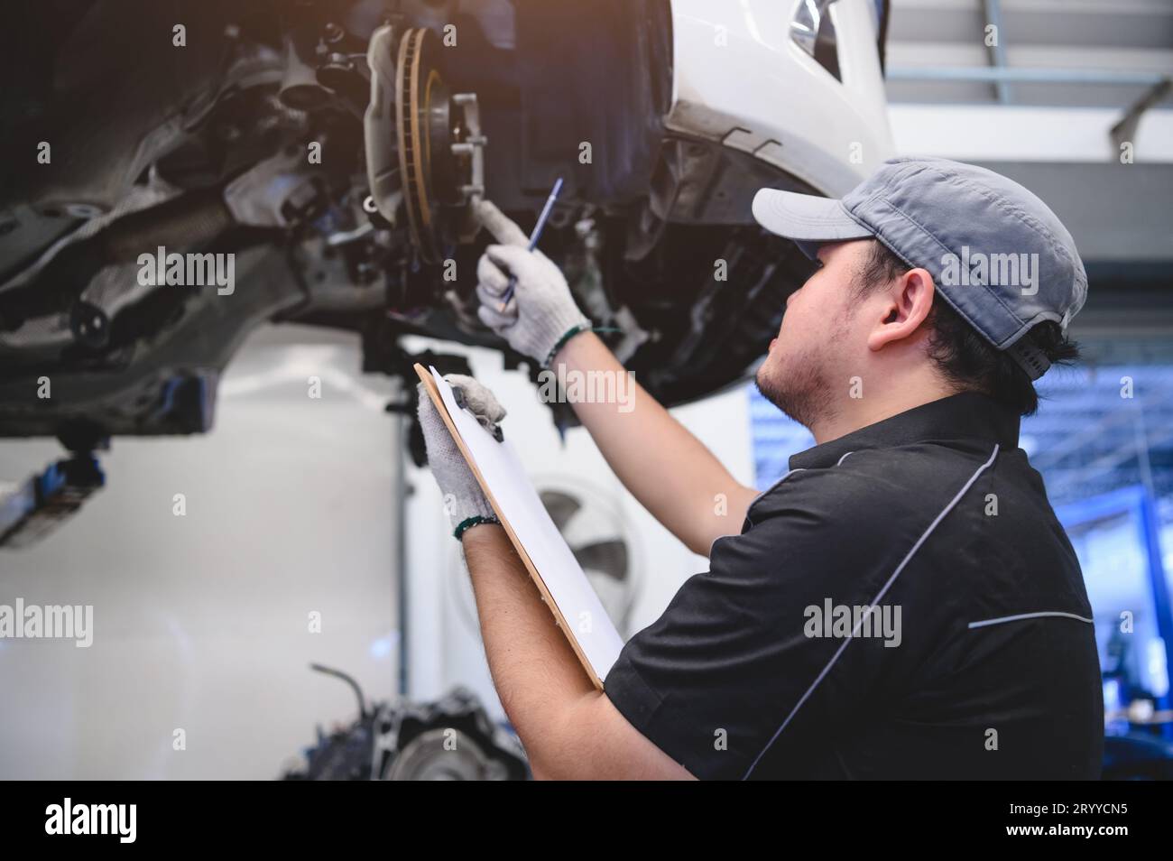 Asian male technician hi-res stock photography and images - Alamy