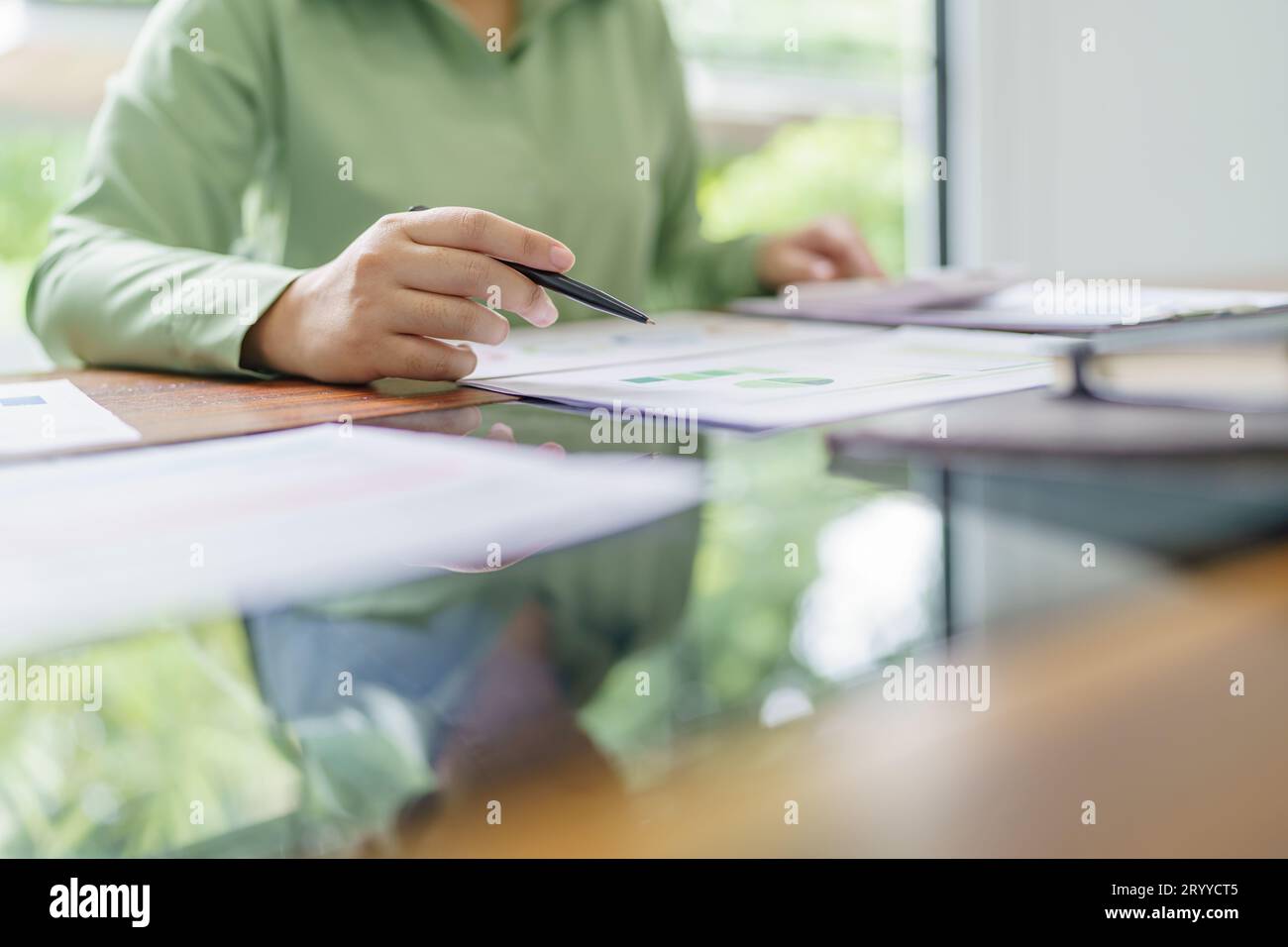 Business woman working in green eco friendly modern working space creative ideas for business eco friendly professional investor Stock Photo